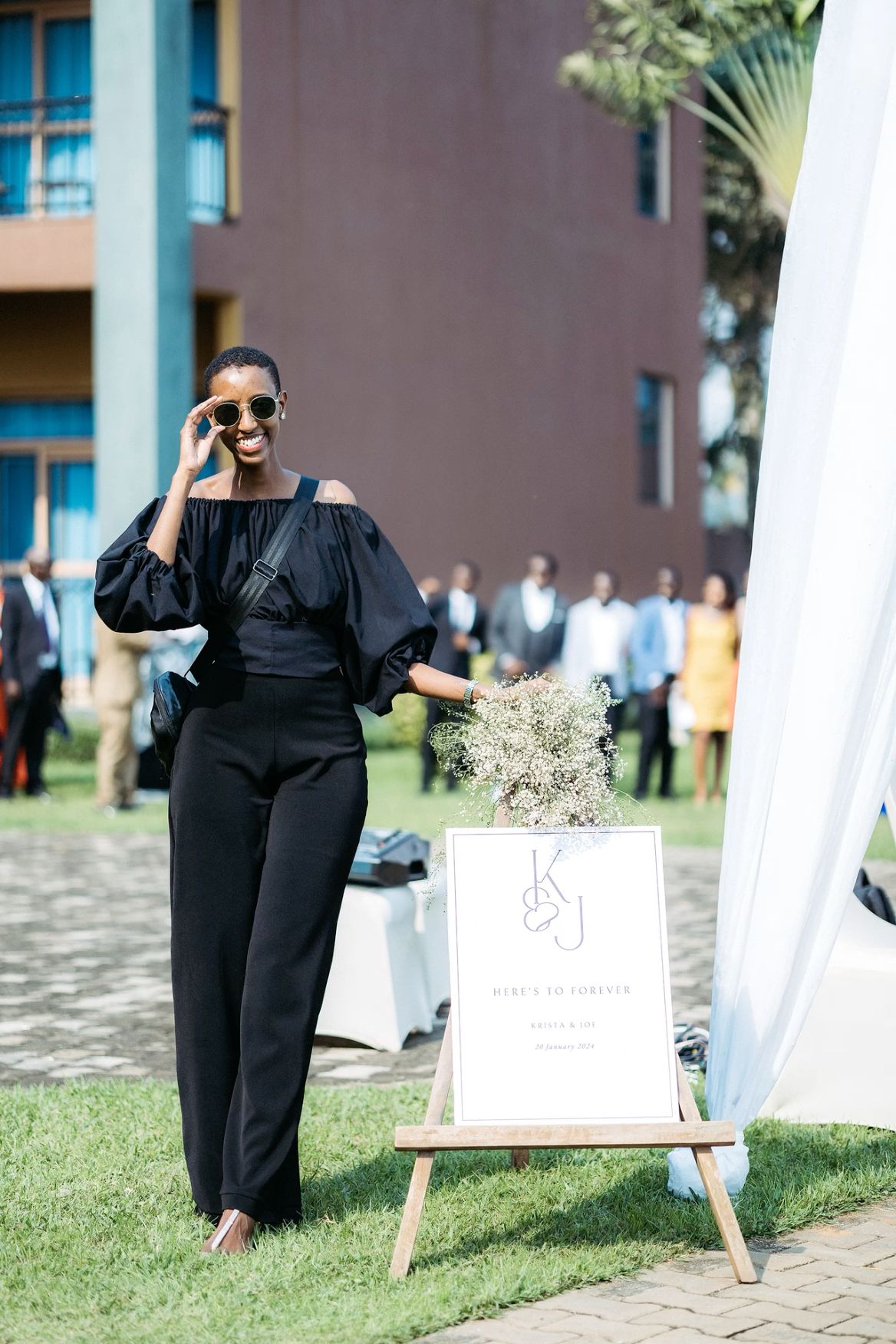 Couple touring a luxury hotel wedding venue with the event coordinator