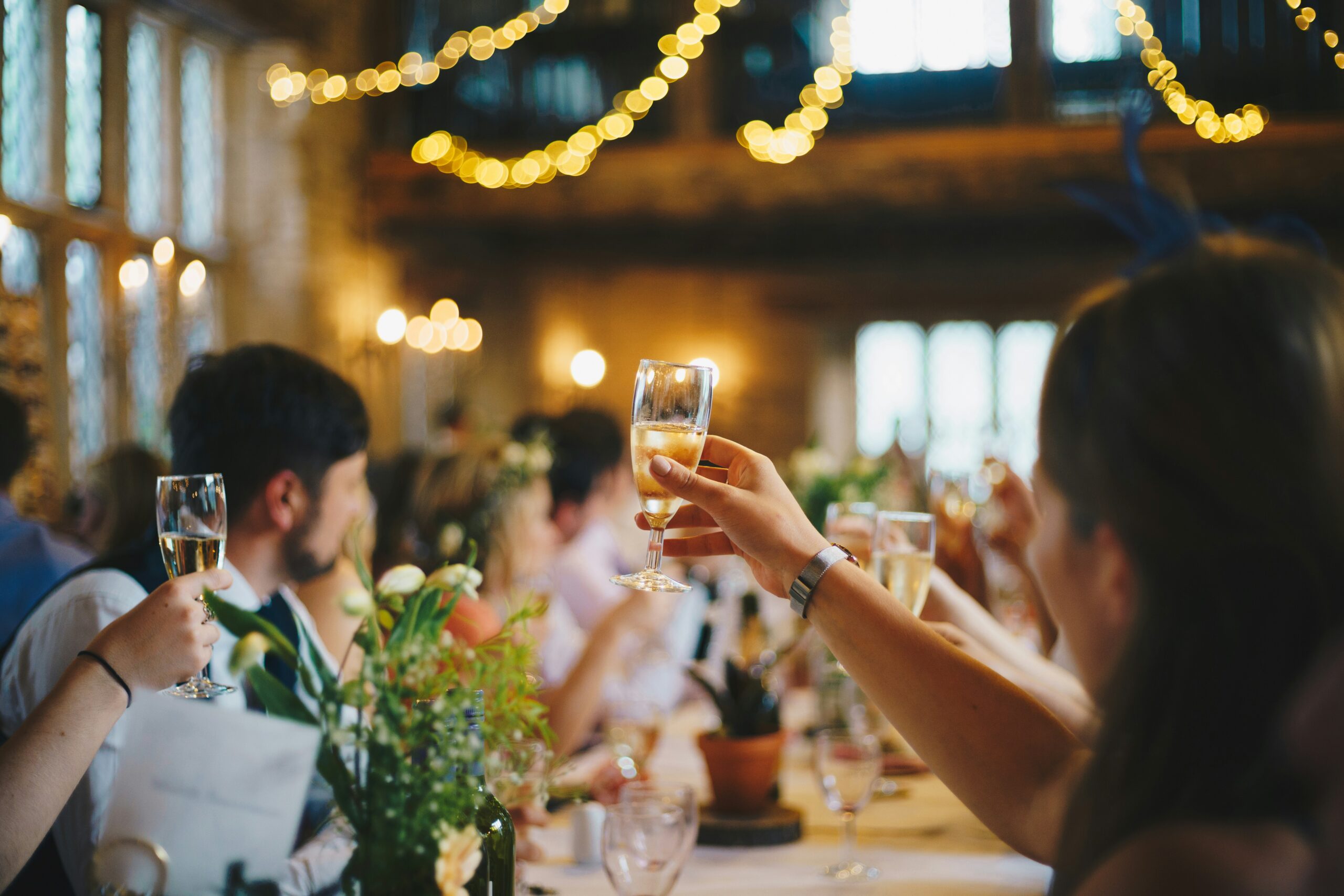 Wedding guests staying together at a resort through a wedding hotel room block